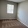 bedroom with carpet and window at Cary Pines Apartments in Cary, NC