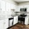 kitchen with white cabinets and stainless steel appliances at Cary Pines Apartments in Cary, NC