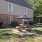Outdoor picnic and grilling area at Cary Pines Apartments in Cary, NC