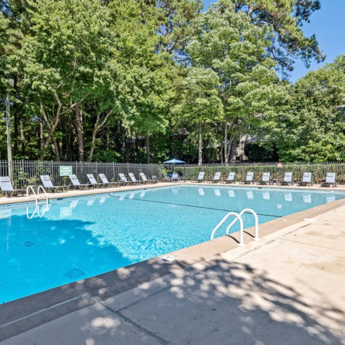 Pool with a sundeck at Cary Pines Apartments in Cary, NC Pool with a sundeck at Cary Pines Apartments in Cary, NC