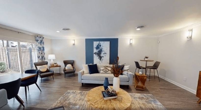 Cary Pines Resident Clubhouse living room with modern decor at Cary Pines Apartments in Cary, NC