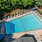 Swimming pool  with a sundeck at Cary Pines Apartments in Cary, NC