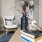 close-up of books and decorations on shelf in living room at Cary Pines Apartments in Cary, NC