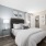 bedroom with walk-in closet and bathroom access at Cary Pines Apartments in Cary, NC