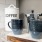 coffee mugs, and accoutrements on kitchen counter at Cary Pines Apartments in Cary, NC